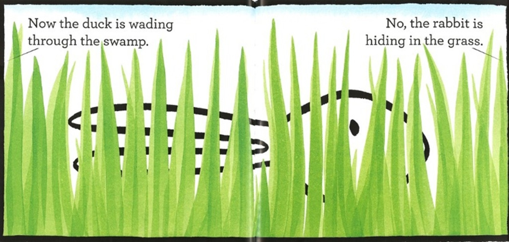 image of the duck or rabbit walking through green grass or a swamp